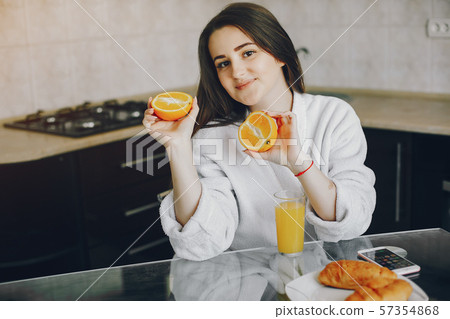 girl in a white dressing gown girl in a white dressing gown 57354868