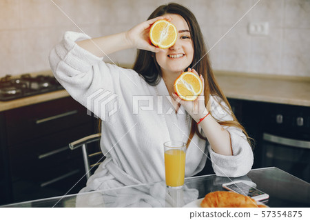 girl in a white dressing gown girl in a white dressing gown 57354875