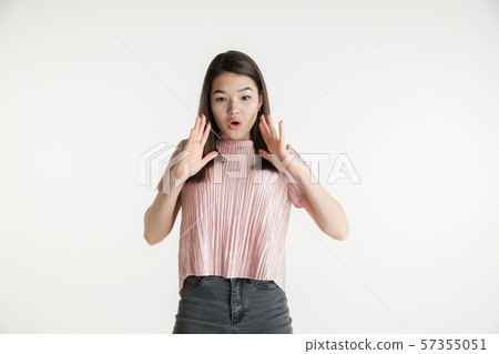 Beautiful girl's half-length portrait on white studio background 57355051
