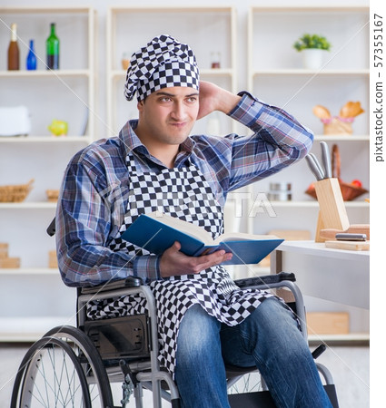 Young man cook with book of food recipes 57355167