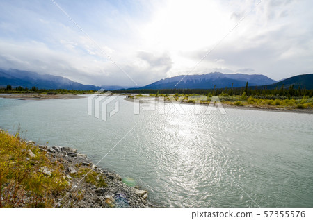 Autumn Canadian Rockies Jasper Yellow leaves and mountains along the Athabasca River (Alberta, Canada) 57355576