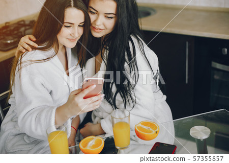 girls in a white dressing gown girls in a white dressing gown 57355857