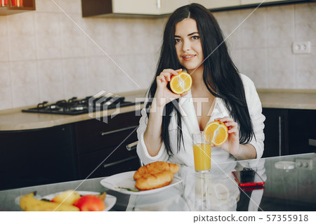girl in a white dressing gown 57355918