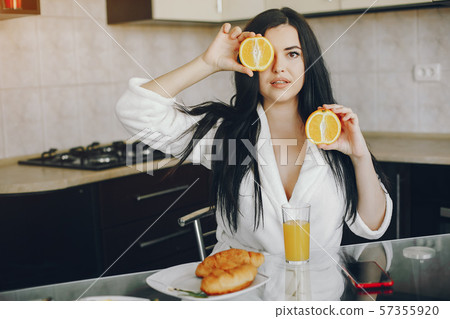 girl in a white dressing gown girl in a white dressing gown 57355920