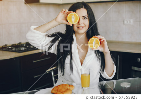 girl in a white dressing gown 57355925