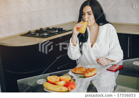 girl in a white dressing gown girl in a white dressing gown 57356053