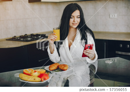 girl in a white dressing gown girl in a white dressing gown 57356055