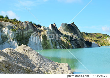Mountain lake or river with a turquoise or blue tint of water in a rock canyon in the Belarus Mountain lake or river with a turquoise or blue tint of water in a rock canyon in the Belarus 57359677