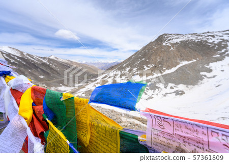 Snow mountain view with tibetan prayer flag on hill 57361809