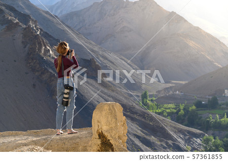 Young asian woman taking photos of landscape 57361855