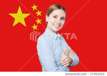 Happy woman with thumb up against the People's Happy woman with thumb up against the People's 57362010