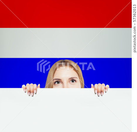 Love Netherlands! Happy woman smiling and showing 57362013