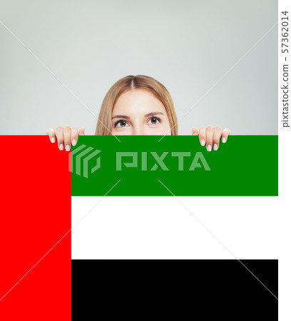Happy woman student with the UAE flag background. Happy woman student with the UAE flag background. 57362014