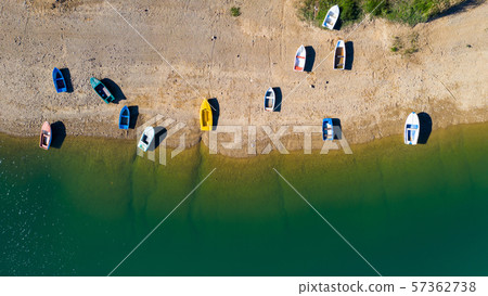 Aerial view of boats on the beach. Aerial view of boats on the beach. 57362738