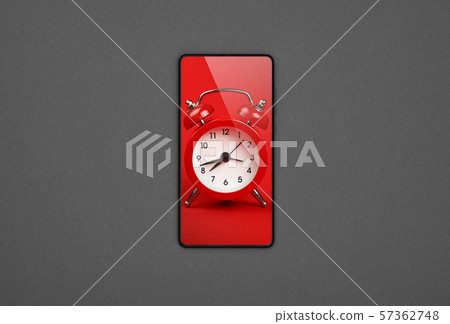 Smartphone with red alarm clock screen over grey 57362748