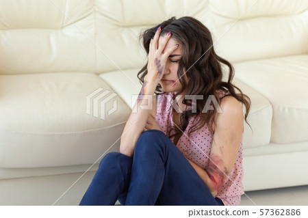 Victim, abuse and domestic violence - Woman crying, suffering domestic violence Victim, abuse and domestic violence - Woman crying, suffering domestic violence 57362886