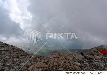 Trekking in Italy Alps for health 57363258