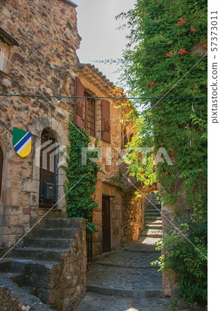 Stone houses in an alley at the hamlet of Les Arcs-sur-Argens Stone houses in an alley at the hamlet of Les Arcs-sur-Argens 57373011