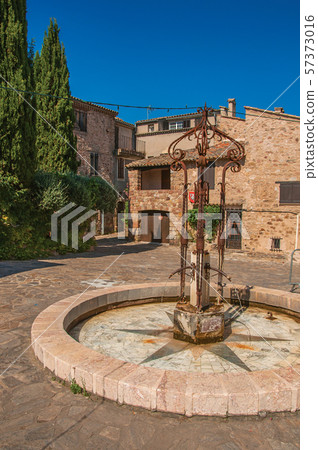 Stone houses in a square at the hamlet of Les Arcs-sur-Argens Stone houses in a square at the hamlet of Les Arcs-sur-Argens 57373016
