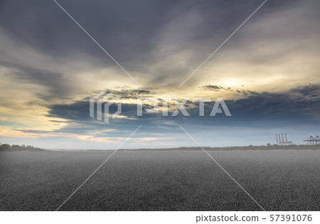 Asphalt road and sky industry background 57391076