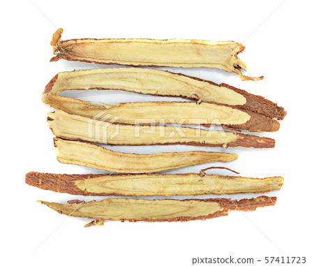 dried Liquorice roots on a white background dried Liquorice roots on a white background 57411723