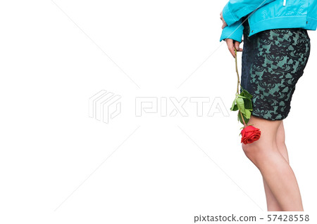 a view of the waist and legs of a beautiful girl with a red rose flower in her hand a view of the waist and legs of a beautiful girl with a red rose flower in her hand 57428558