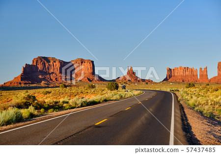 Empty scenic highway in Monument Valley Empty scenic highway in Monument Valley 57437485