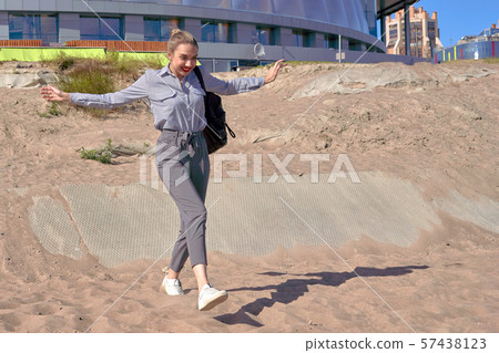 Beautiful girl runs wide spread arms, emotion on Beautiful girl runs wide spread arms, emotion on 57438123
