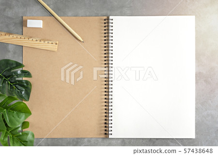 blank sketchbook and green leaves blank sketchbook and green leaves 57438648