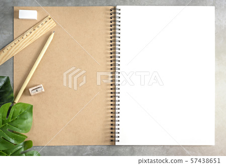 blank sketchbook and green leaves blank sketchbook and green leaves 57438651