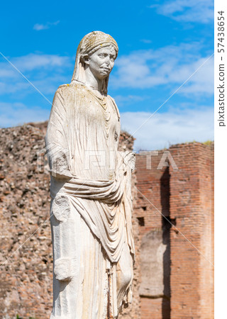 Antique marble statue of Vestal Vigin. House of Vestals at Roman Forum, Rome, Italy 57438654