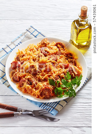 Cabbage stew with sausages on a plate Cabbage stew with sausages on a plate 57439061