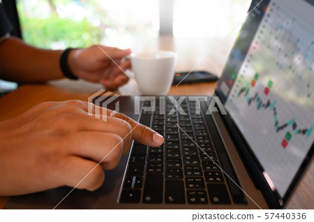 man using a computer to work Laptop, Computer man using a computer to work Laptop, Computer 57440336