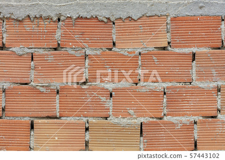 The pronounced texture of corpulent brick 57443102