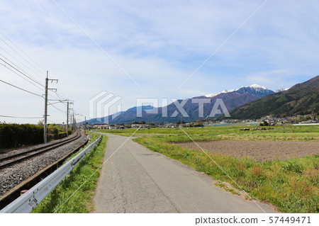 Rural landscape and Kiso mountain range (Ina City, Nagano Prefecture) 57449471