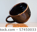Ceramic brown cup 57450033