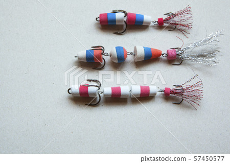 foam rubber fish bait paper background  57450577