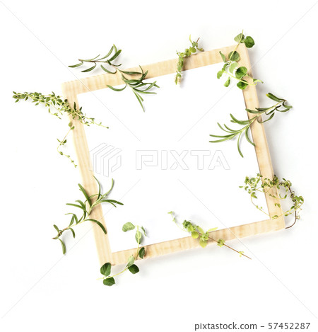 Cooking a Recipe Design Template. A clipboard with aromatic kitchen herbs, shot from the top on a 57452287