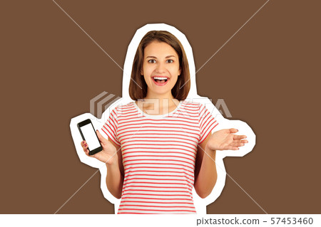 Surprised smiling young female blogger, got 57453460