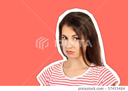 portrait of girl frown her face in displeasure. 57453484