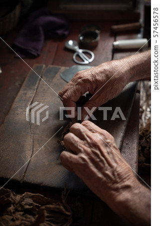 Cigar rolling or making by torcedor in cuba 57456578