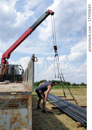 The master and his assistant send a metal profile, 57456684