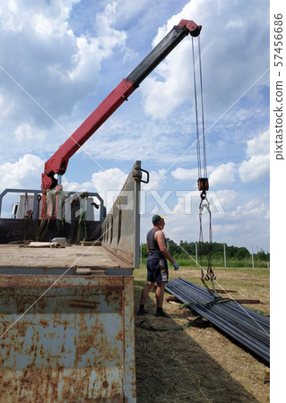 The master and his assistant send a metal profile, 57456686