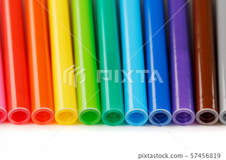 Multi-colored felt-tip pens, markers on a white isolated background Multi-colored felt-tip pens, markers on a white isolated background 57456819