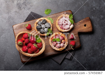 Set of cakes with berries 57456967