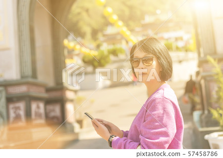 woman using the cellphone woman using the cellphone 57458786