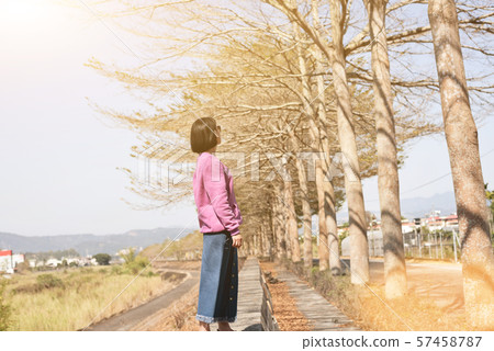 Asian woman stand in the outside 57458787