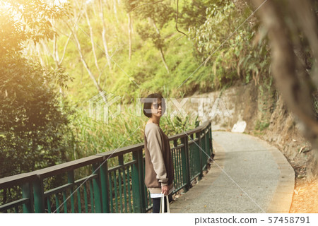 Asian woman hiking Asian woman hiking 57458791