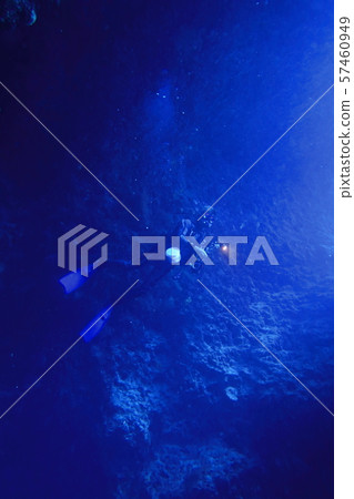 Diver standing still in the room of the queen of the seabed cave at the diving spot in Shimojijima, Miyakojima city 57460949