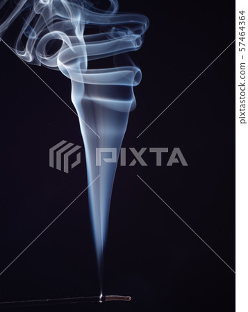 White smoke from burning incense isolated on black 57464364